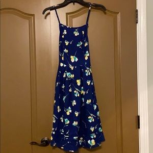 Blue dress w/ flowers,straps that cross in back